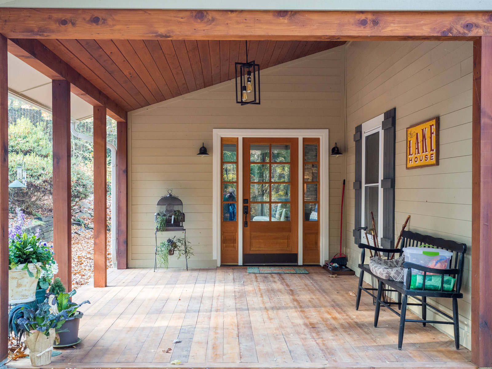 Covered porch addition integrated with the existing home