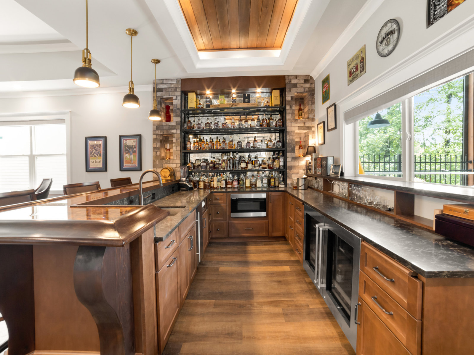 Crestline whole house remodel in Dawsonville, GA by All-Square Contracting — custom home bar with copper counter, stone backsplash and open shelving